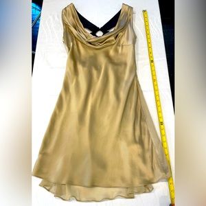 Radenroro of New York, 100% Silk gold with black detail back designs.